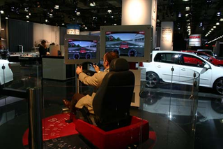 Illustration for article titled Play With It: Top Seven Examples Of Automaker-Video Game Industry Love-Making In New York